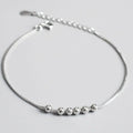 Bracelet à breloques perles et boules en argent sterling