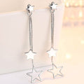 Boucles d'oreilles pendantes longues étoile en argent sterling