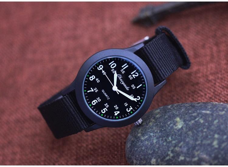 Montres Quartz Enfant Montres Filles Étanches Cadeaux Horloge Enfants Toile Montres Mode Montres Foncées Pour Hommes Imperméable Montre-bracelet Homme Sport Extérieur De Terrain Avec Bracelet En Nylon