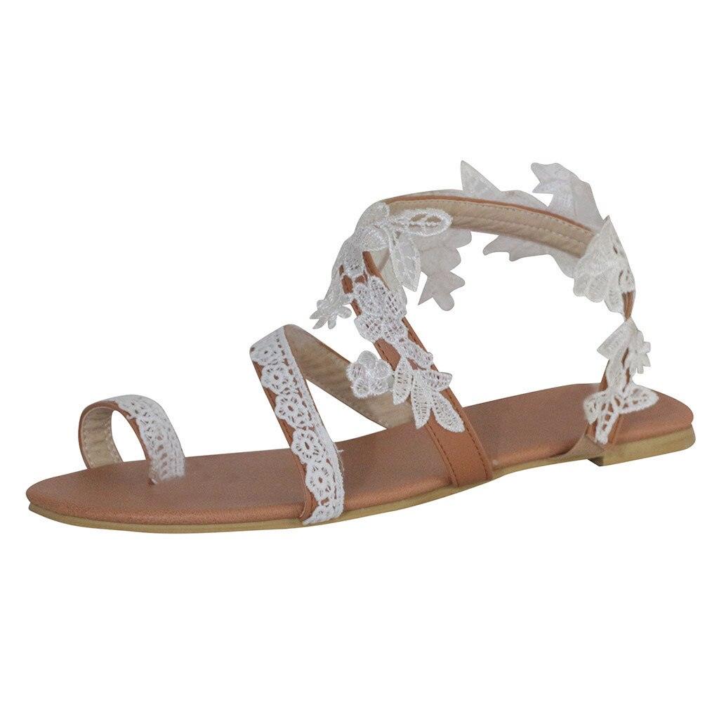 Sandales d'été pour femmes, chaussures plates à enfiler, en dentelle blanche, plates, à pince, décontractées, à lacets, à motif floral, pour la plage, confortables, élégantes, à anneau d'orteil, confortables