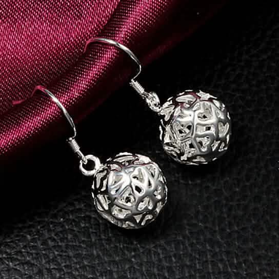 Boucles d'oreilles boule en trois dimensions