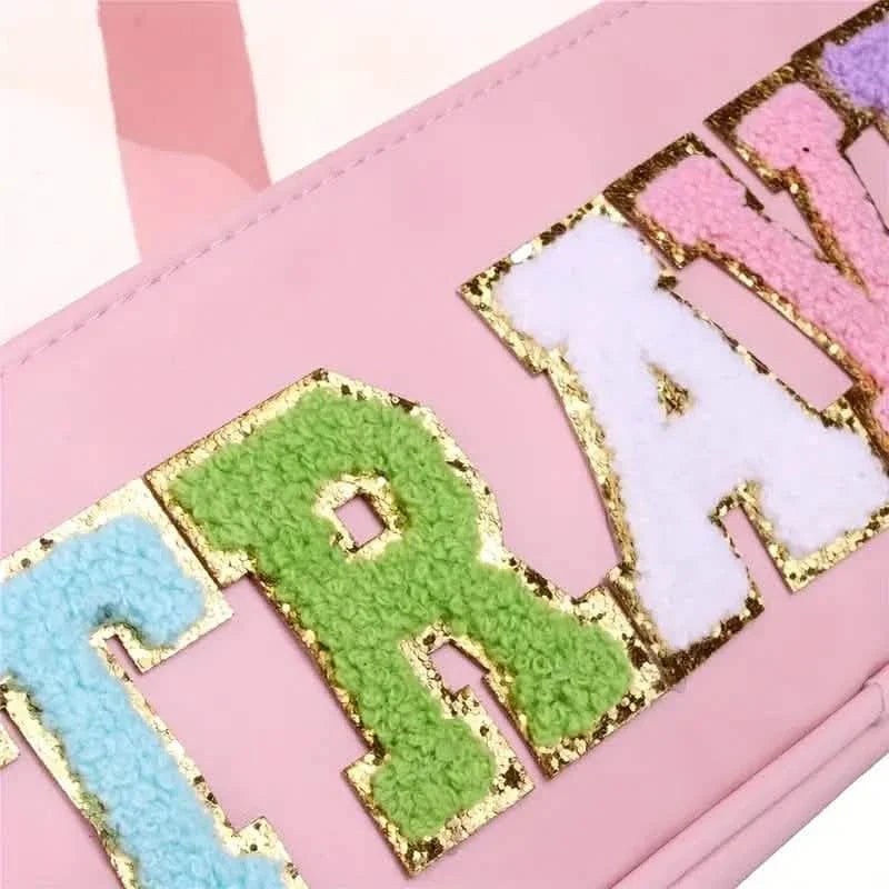 Trousse de maquillage transparente à motif lettres avec poignée