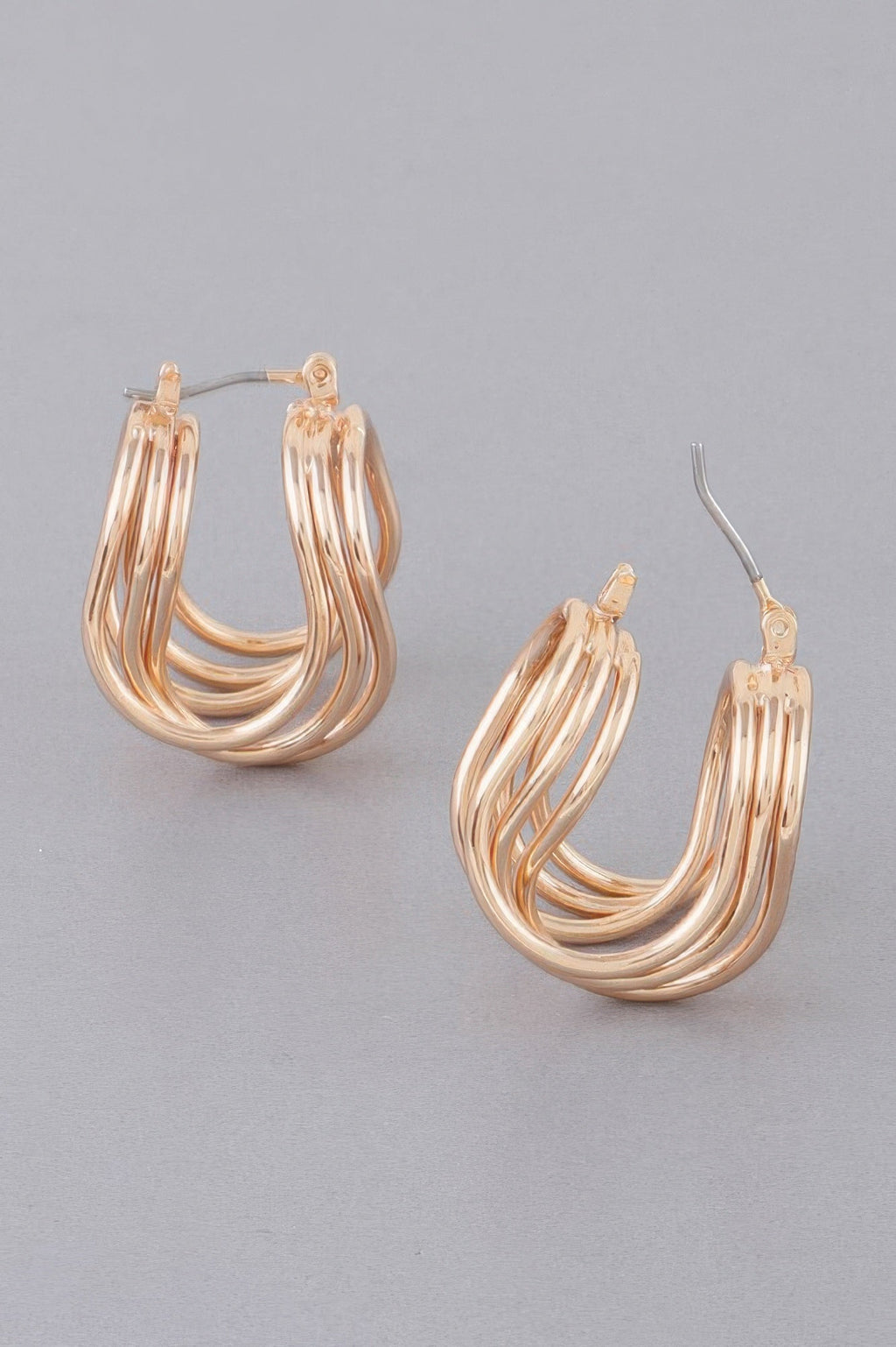 Boucles d'oreilles créoles triple enroulées fil brillant