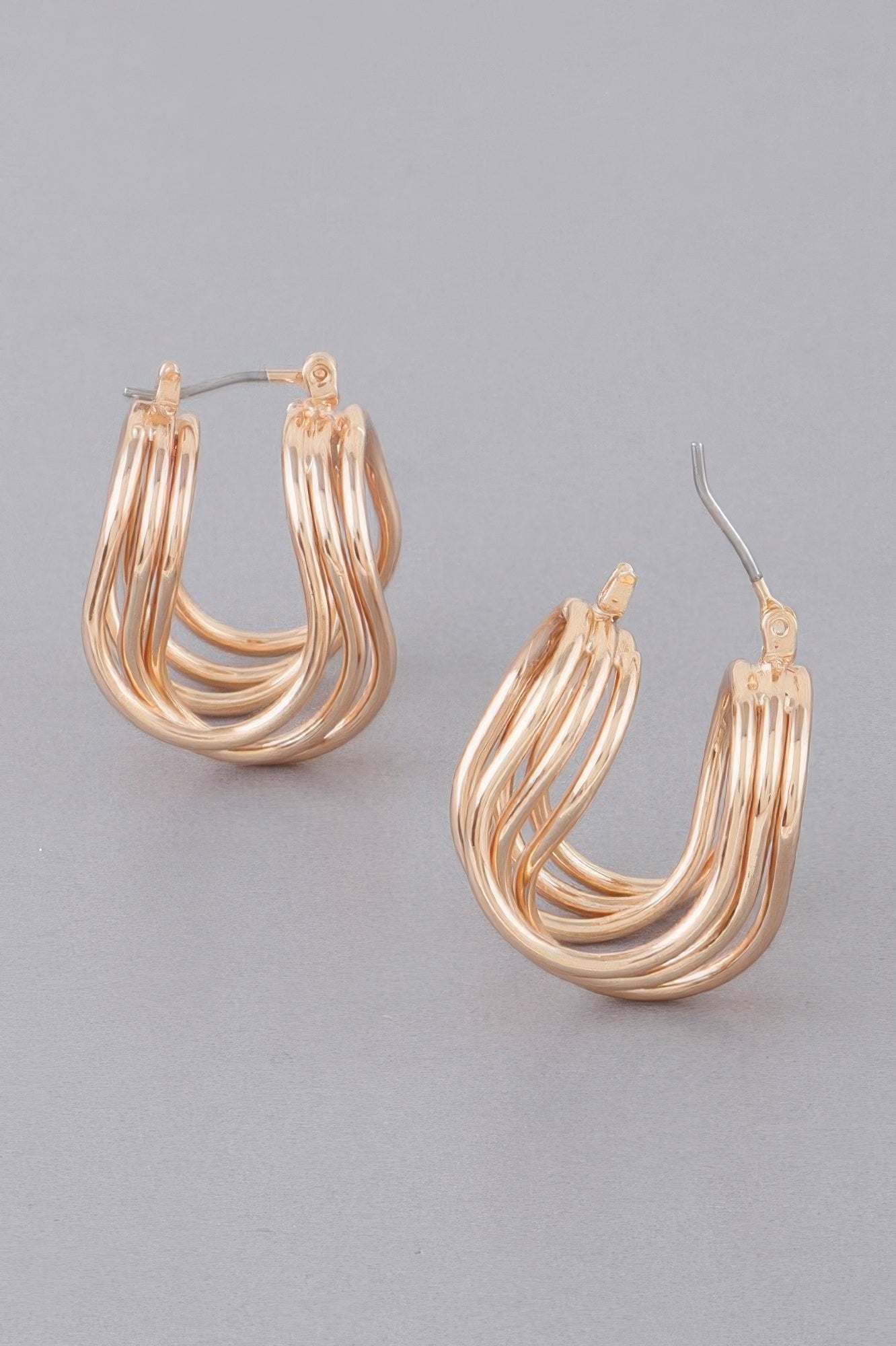 Boucles d'oreilles créoles triple enroulées fil brillant