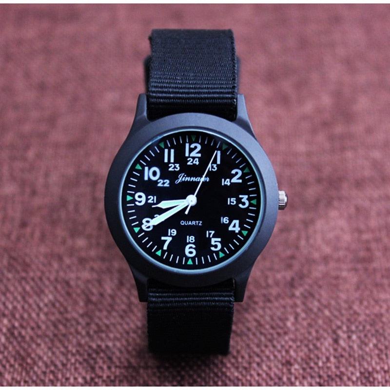 Montre unisexe en nylon pour enfants, style sport, fine, pour étudiants, en toile, à quartz, avec affichage militaire, montre-bracelet de sport militaire pour homme avec bracelet en nylon coulissant.