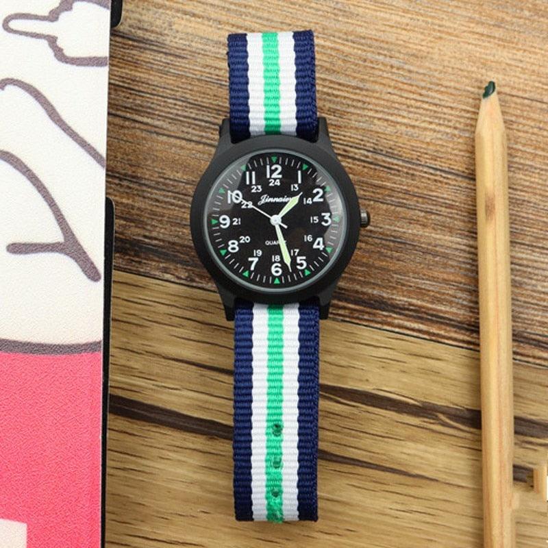 Montre unisexe en nylon pour enfants, style sport, fine, pour étudiants, en toile, à quartz, avec affichage militaire, montre-bracelet de sport militaire pour homme avec bracelet en nylon coulissant.
