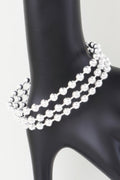 Bracelet manchette large à trois rangs de perles