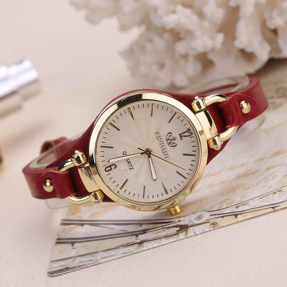 Montres décontractées pour femmes Cadran rond Bracelet en cuir PU Montre-bracelet analogique à quartz Montre de luxe à la mode Montres unisexes Bracelet en cuir Montre-bracelet analogique à quartz