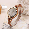 Montres décontractées pour femmes Cadran rond Bracelet en cuir PU Montre-bracelet analogique à quartz Montre de luxe à la mode Montres unisexes Bracelet en cuir Montre-bracelet analogique à quartz