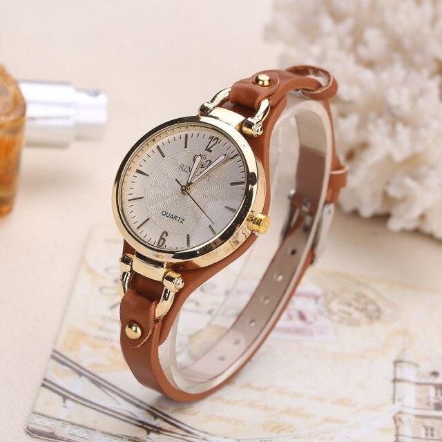 Montres décontractées pour femmes Cadran rond Bracelet en cuir PU Montre-bracelet analogique à quartz Montre de luxe à la mode Montres unisexes Bracelet en cuir Montre-bracelet analogique à quartz