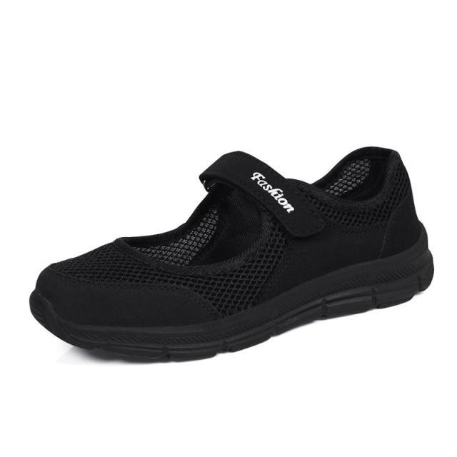 Baskets plates décontractées à la mode en maille respirante pour femmes Chaussures d'été plates et souples à la mode légères à enfiler super légères pour femmes