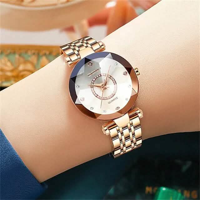 Montre classique à quartz dorée et argentée pour femme