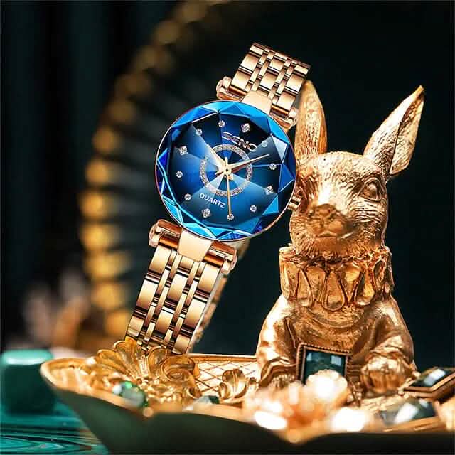 Montre classique à quartz dorée et argentée pour femme