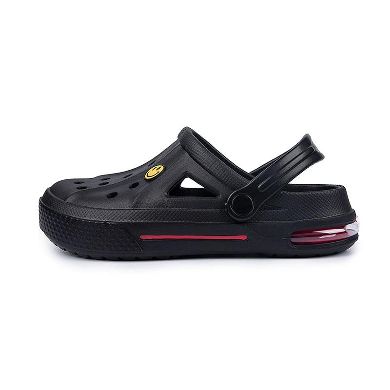 Sandales pour Femmes Été Trous Chaussures en Caoutchouc Sabots Chaussures de Jardin Noires Sandales Plates de Plage Sabots de Jardin Sandales Légères à Enfiler Classiques Réglables Chaussons de Marche d'Extérieur