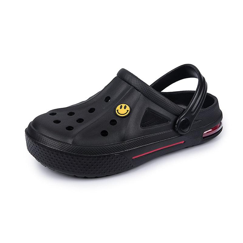 Sandales pour Femmes Été Trous Chaussures en Caoutchouc Sabots Chaussures de Jardin Noires Sandales Plates de Plage Sabots de Jardin Sandales Légères à Enfiler Classiques Réglables Chaussons de Marche d'Extérieur