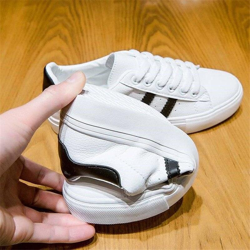 Chaussures décontractées blanches pour femmes Baskets décontractées plates pour femmes Chaussures vulcanisées respirantes pour filles Baskets confortables en cuir écologique à lacets de style décontracté blanc Baskets de rue