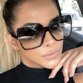 Lunettes surdimensionnées pour femme avec monture en PC noire