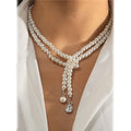 Collier de perles fantaisie élégant à plusieurs rangs pour femme, pendentif pompon bohème, bijoux à double rangée