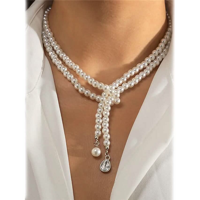 Collier de perles fantaisie élégant à plusieurs rangs pour femme, pendentif pompon bohème, bijoux à double rangée