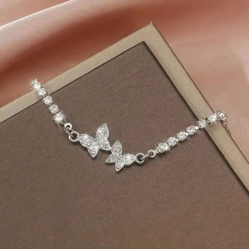 Bracelet en alliage de zinc avec strass papillon scintillant pour femme